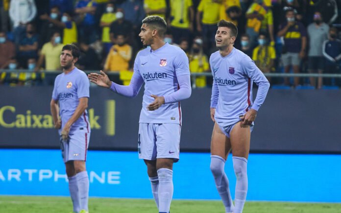 September 23, 2021, CADIZ, CADIZ, SPAIN: Ronald Araujo of FC Barcelona, Barca and Gerard Pique of FC Barcelona protests
